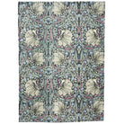 Floral patterned fabric with a green and beige design on a white background