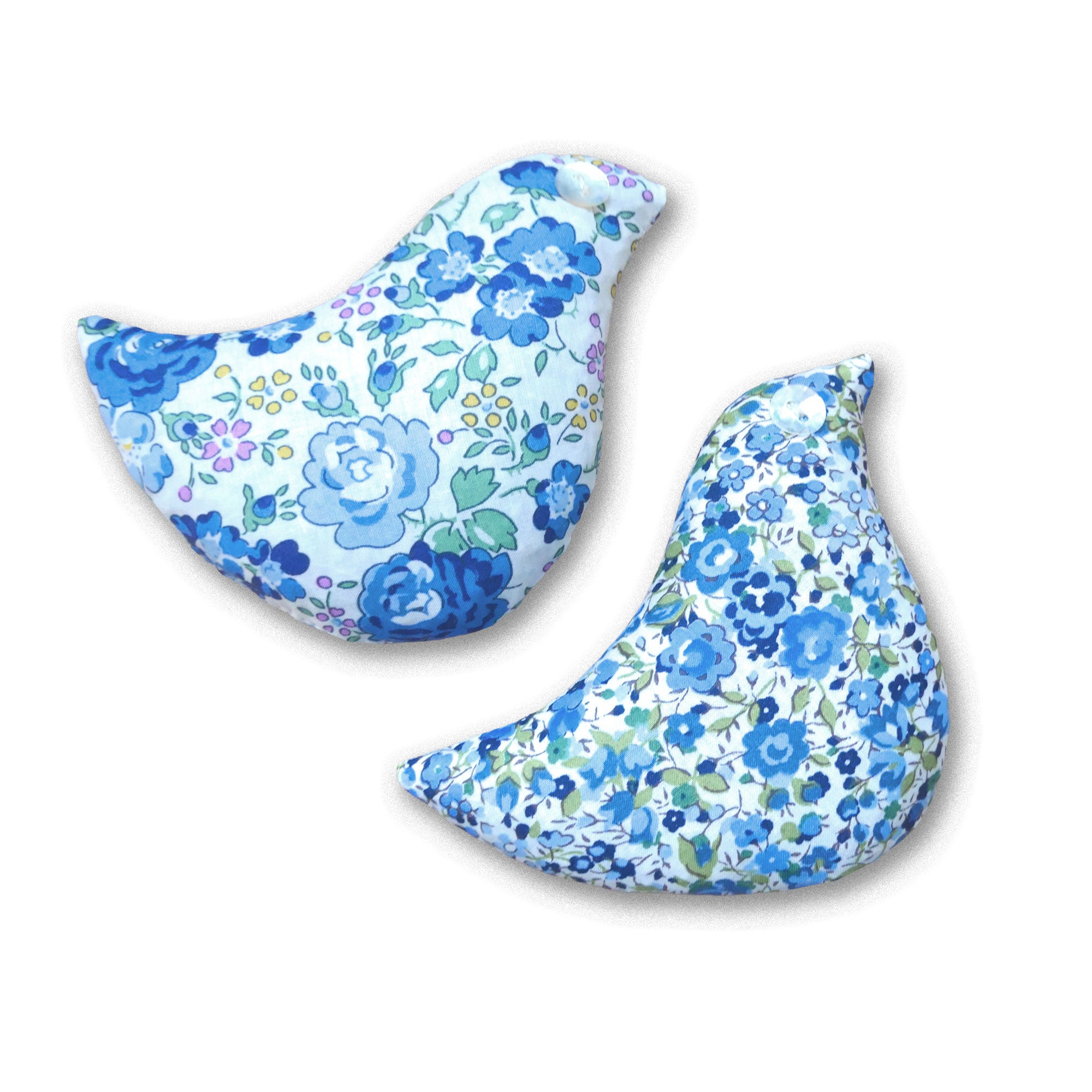 Two blue floral-patterned bird shaped sachets on a white background