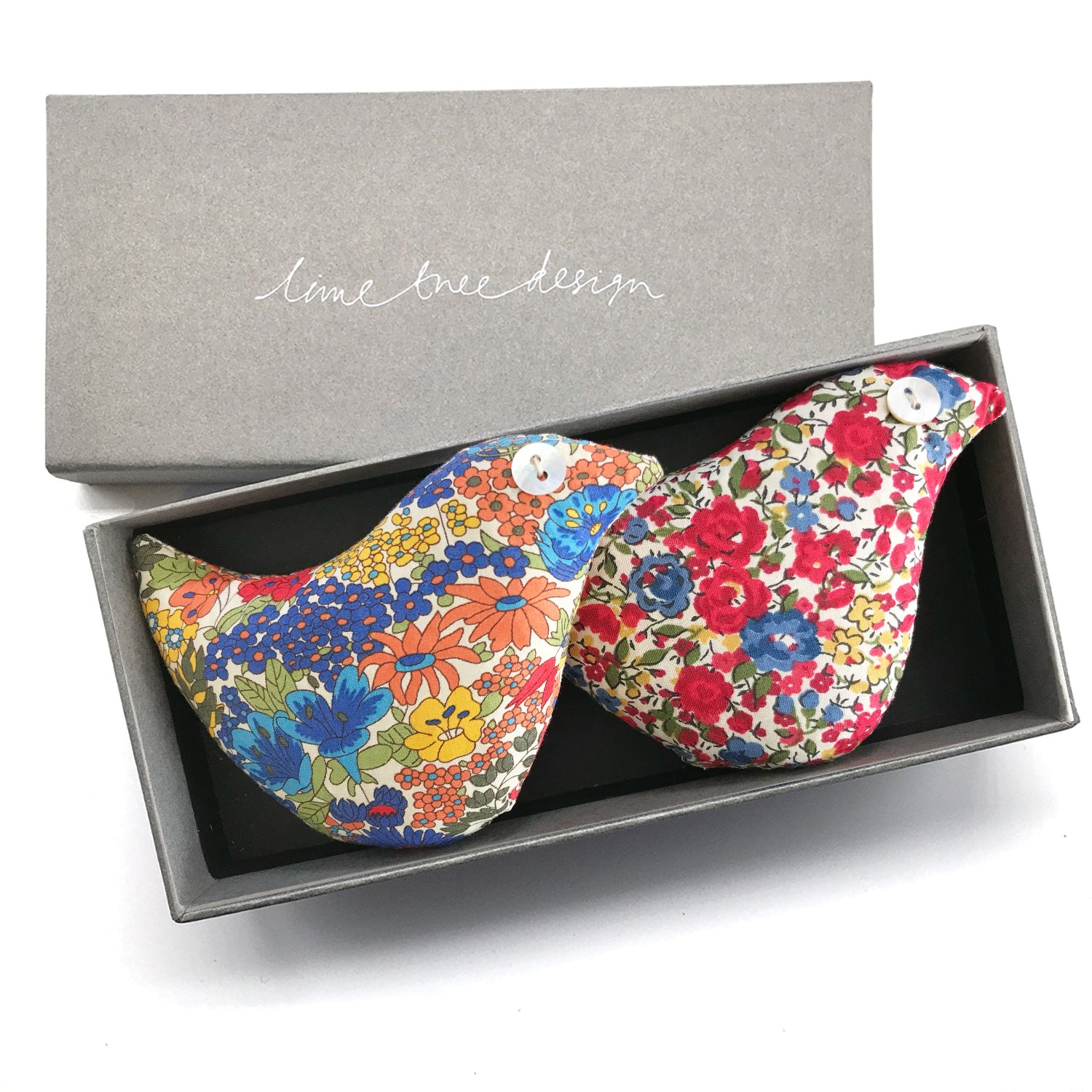 Two lavender bird shaped sachets with a Lime Tree Design branded gift box
