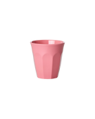 Pink cup on a white background