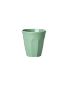 Green cup on a white background