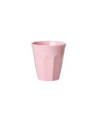 Pink cup on a white background