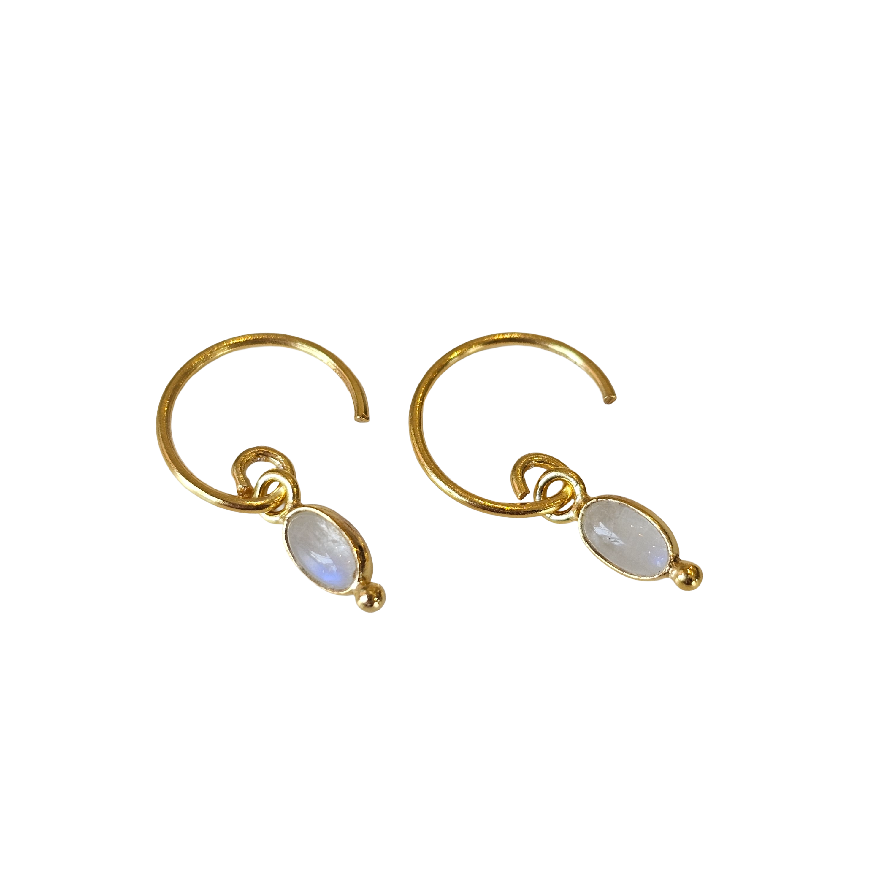 Gold hoop earrings with moonstone stones on a white background