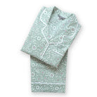 Floral patterned pajama set on a white background