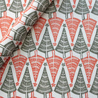 Patterned fabric with Christmas tree design in red, gray, and white.