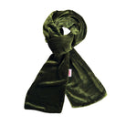 An olive green velvet scarf, neatly folded and looped, shown against a plain white background with a small pink brand tag visible on the side.