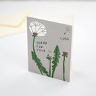 Card with dandelion illustration and text 'Sorry for your loss' on a white background