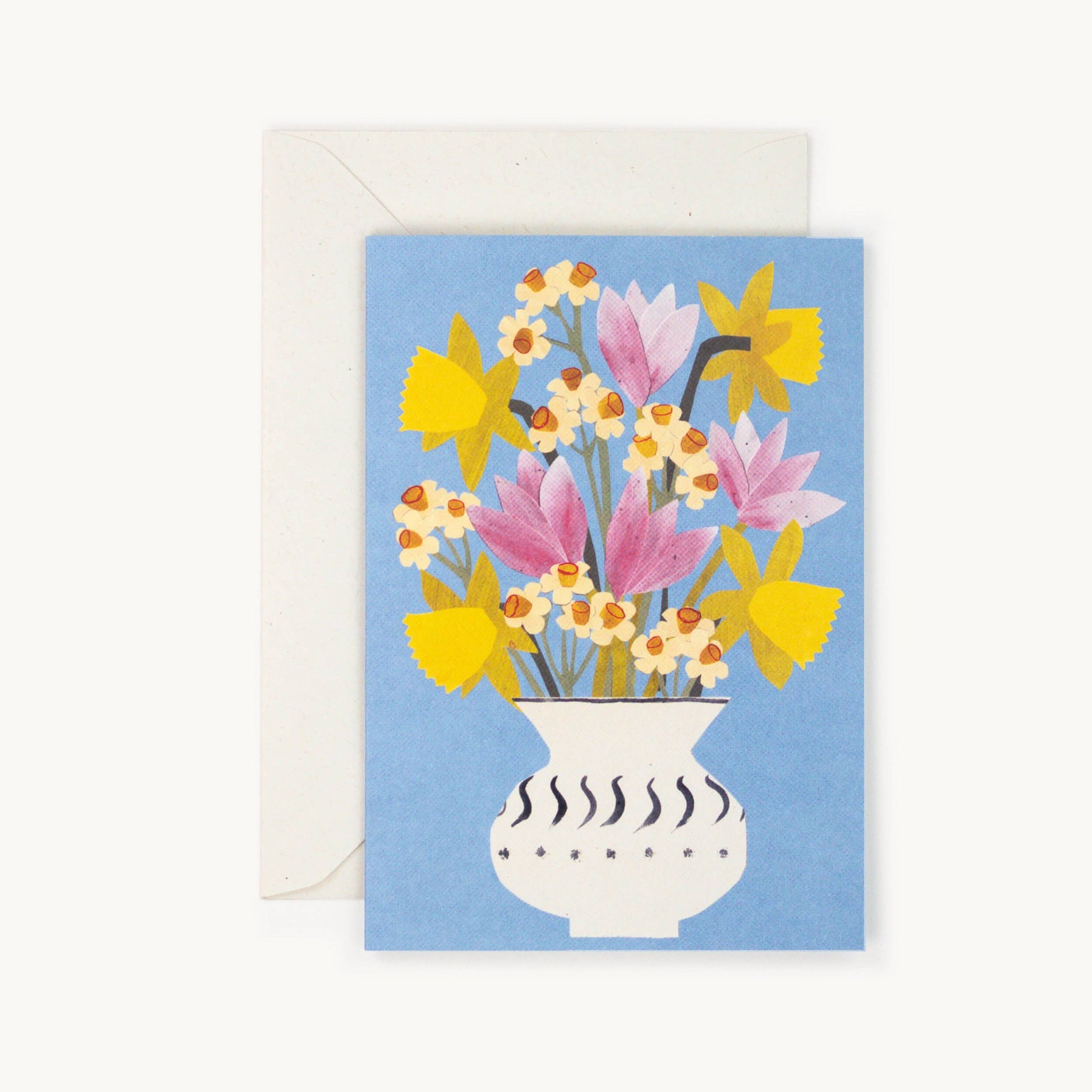 Greeting card with a floral design on a blue background