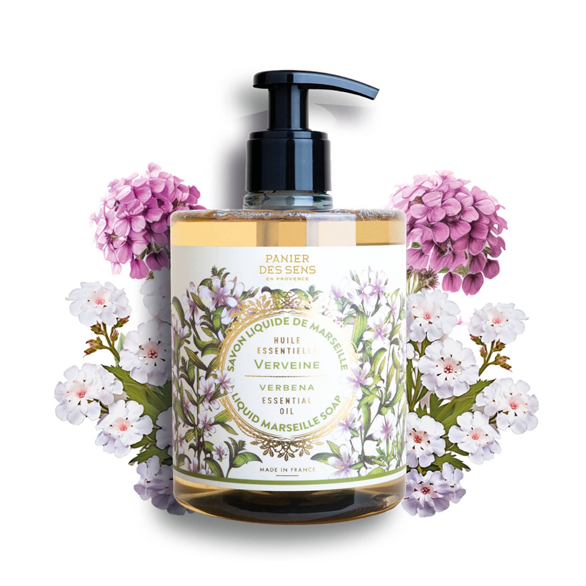 Bottle of liquid soap with floral design on label, surrounded by flowers on a white background