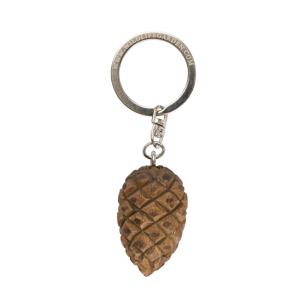 Pine cone keychain on a white background