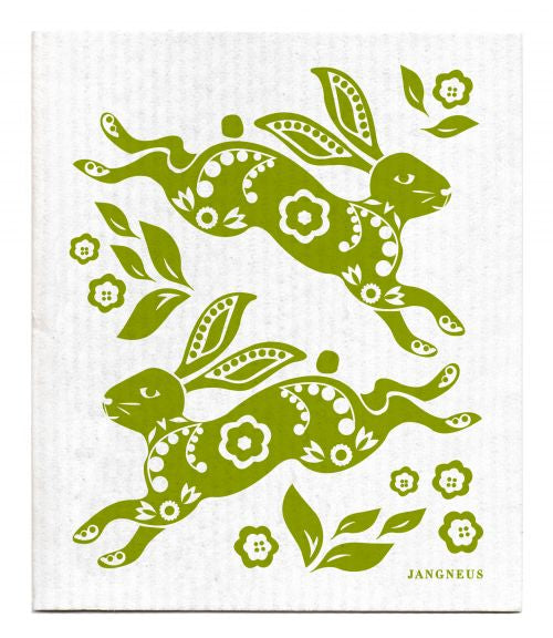 Green rabbits with floral patterns on a white cloth, featuring the brand 'Jangneus'.