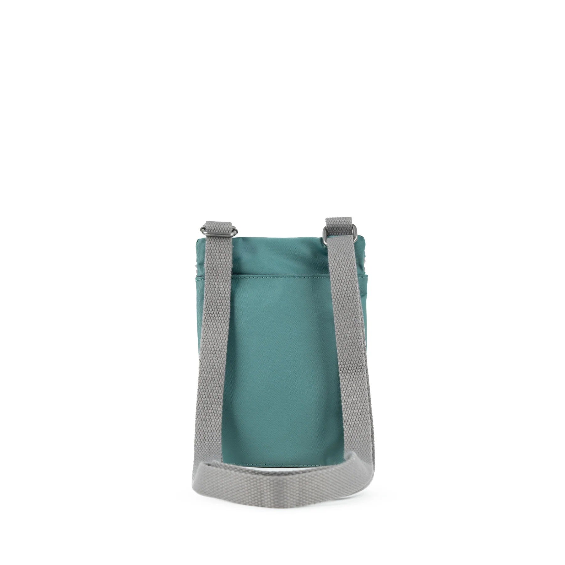 A photo of the back of a small rectangular sage green pocket bag. It has a pocket and grey straps.