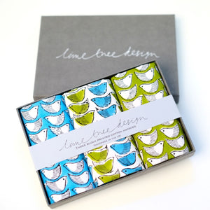 bird watching print hankie in turquoise and green packed into a grey gift box 