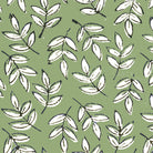 block print fabric close up of green leaf design 